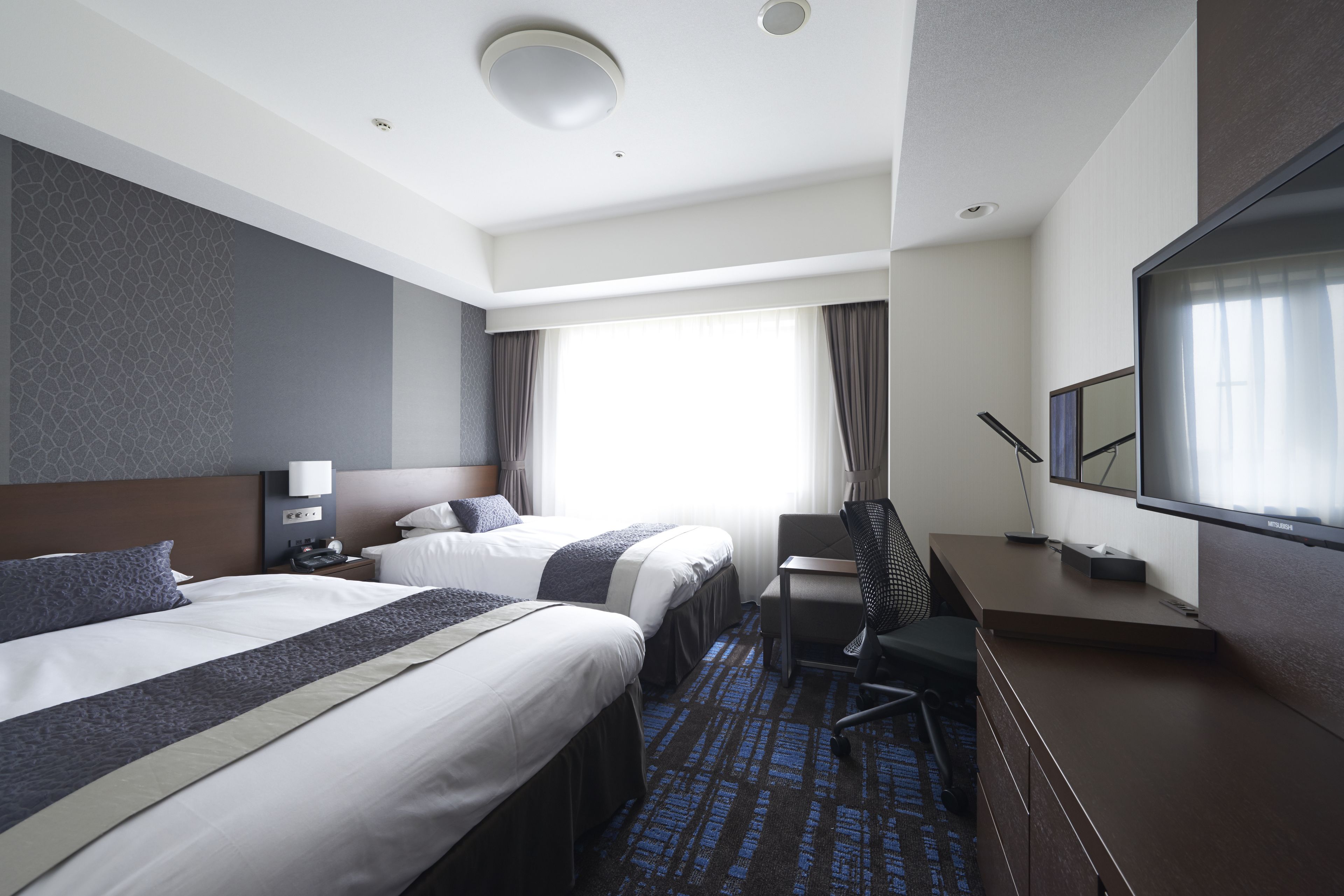 premium bedding, desk, blackout curtains, soundproofing