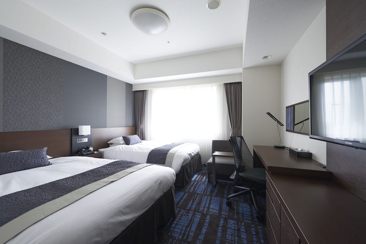 premium bedding, desk, blackout curtains, soundproofing