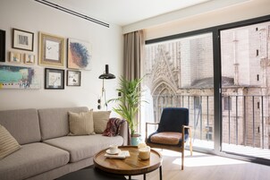 Superior Suite, 2 Bedrooms | Living area | 32-inch flat-screen TV with satellite channels, TV