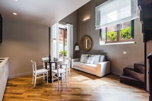Superior Apartment, Terrace | Living area | 32-inch flat-screen TV with digital channels, LED TV - Ferrini Home - Via Monte Sant'Agata (Catania)
