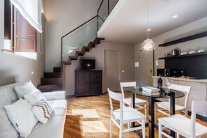 Superior Apartment, Terrace | Living area | 32-inch flat-screen TV with digital channels, LED TV - Ferrini Home - Via Monte Sant'Agata (Catania)