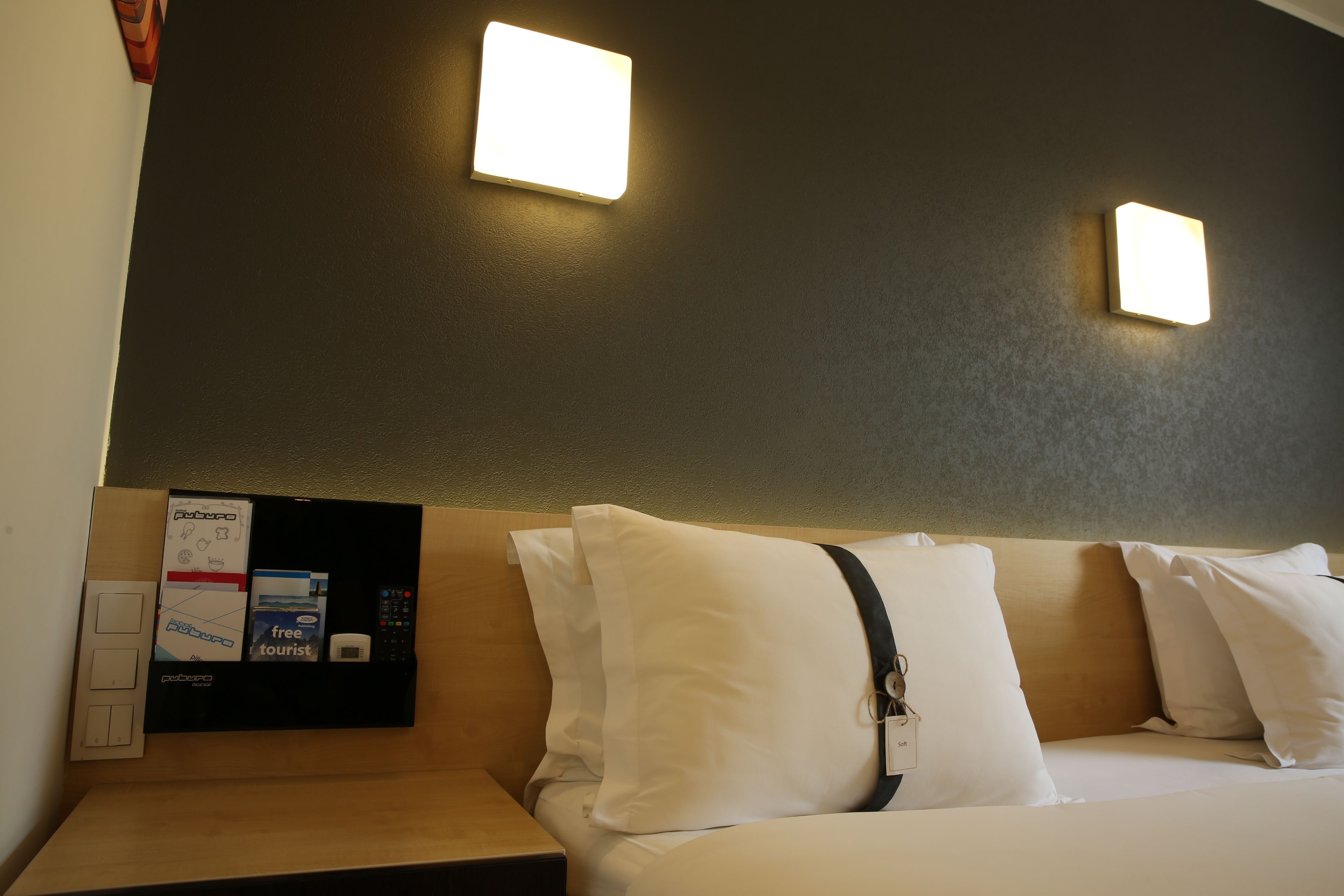 premium bedding, down duvets, memory-foam beds, minibar