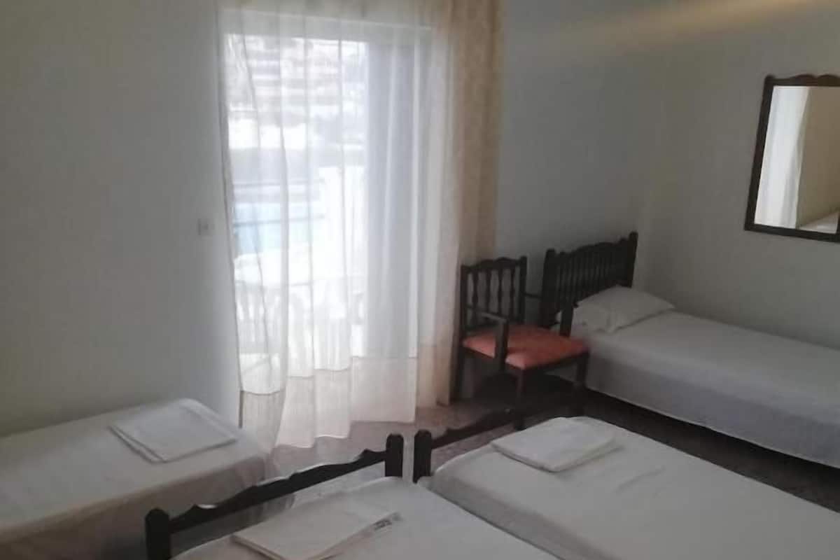 Triple Room, Sea View (3 Adults + 1 Child) | Iron/ironing board, bed sheets