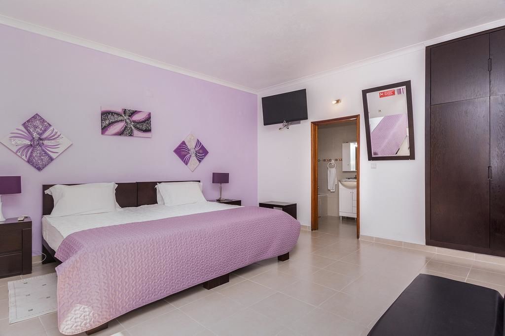 suite | desk, blackout curtains, soundproofing, rollaway beds