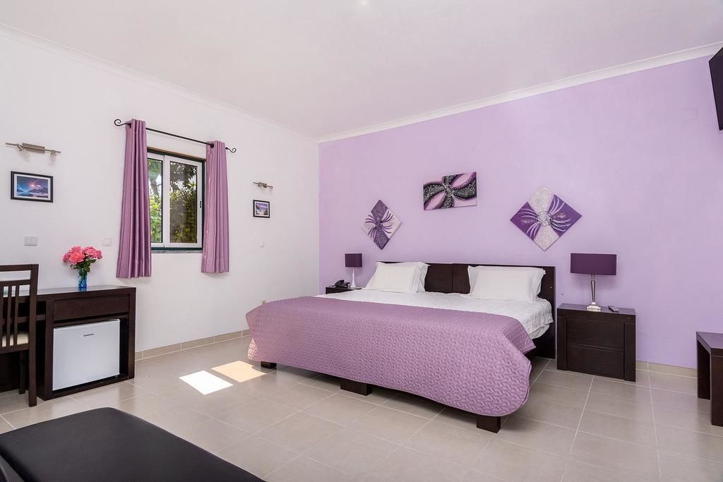 suite | desk, blackout curtains, soundproofing, rollaway beds