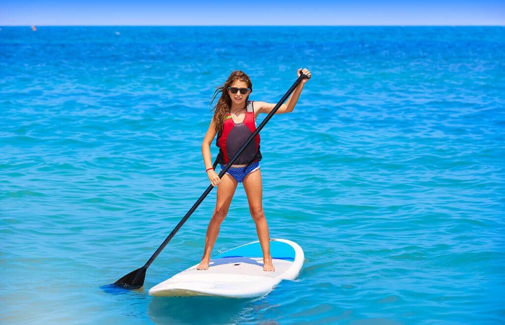 beach nearby, white sand, beach umbrellas, beach towels