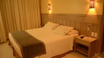 Triple Room | Minibar, in-room safe, blackout drapes, free WiFi