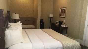 Suite, 1 King Bed, Jetted Tub | Iron/ironing board, free WiFi, bed sheets