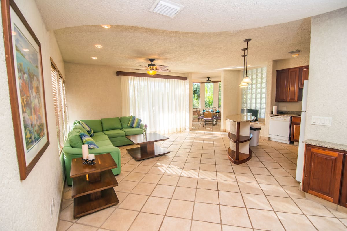 Two Bedroom Master Suite Ground Floor | Living room | 32-inch LED TV with satellite channels, TV