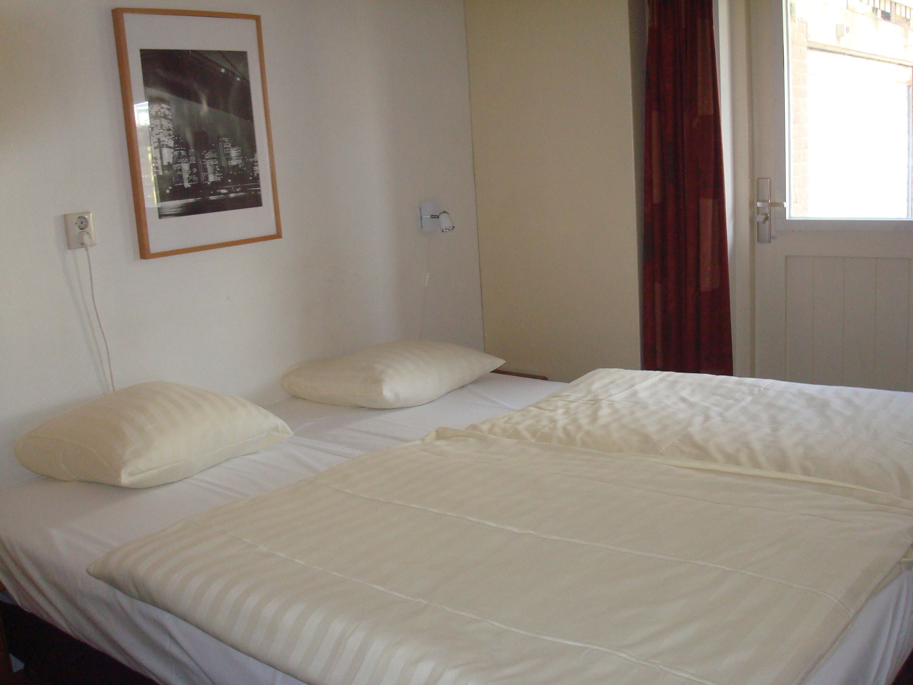 double room, 2 single beds | hypo-allergenic bedding, laptop workspace, blackout curtains, free wifi