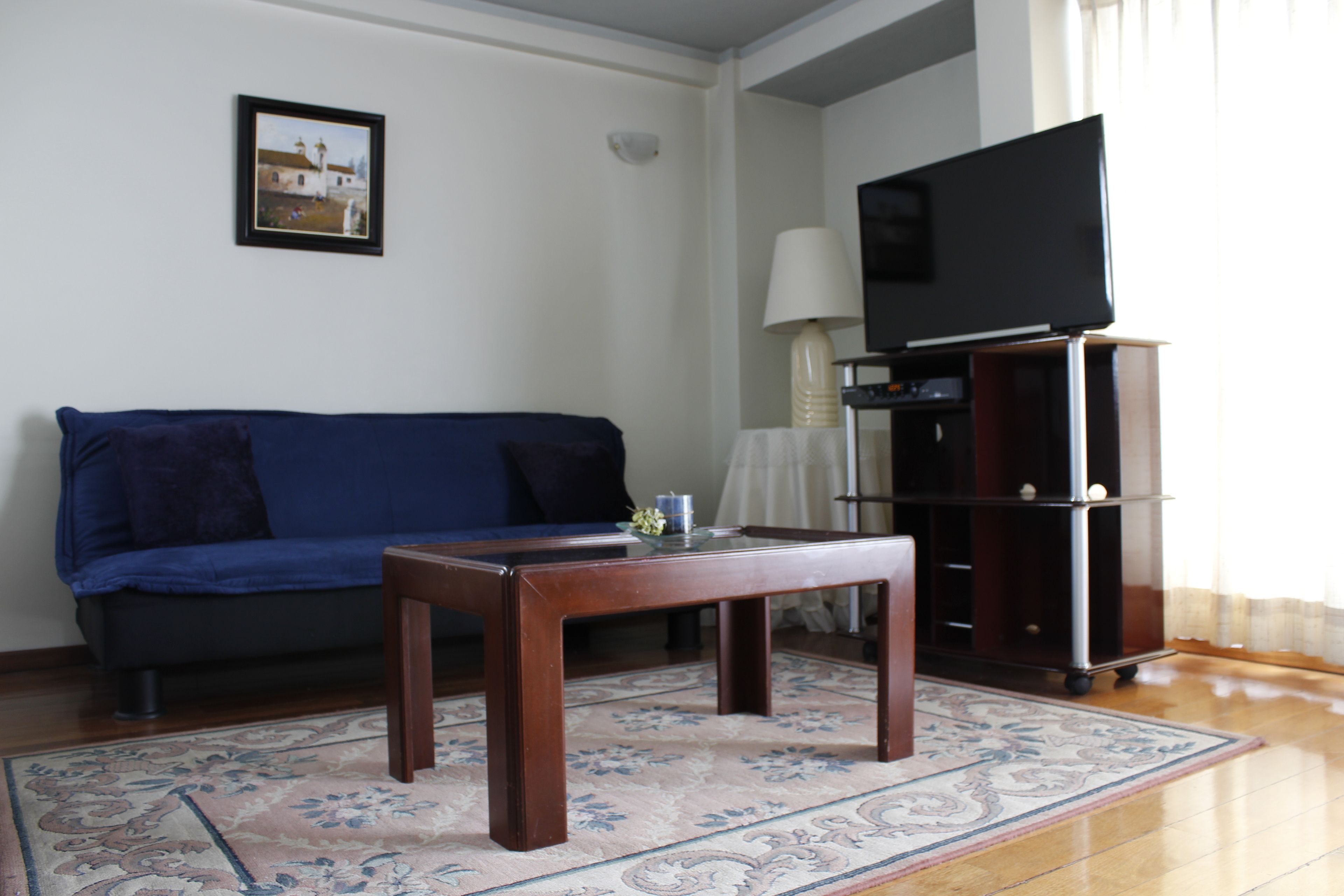 comfort studio suite, city view | living room | flat-screen tv, dvd player, pay films