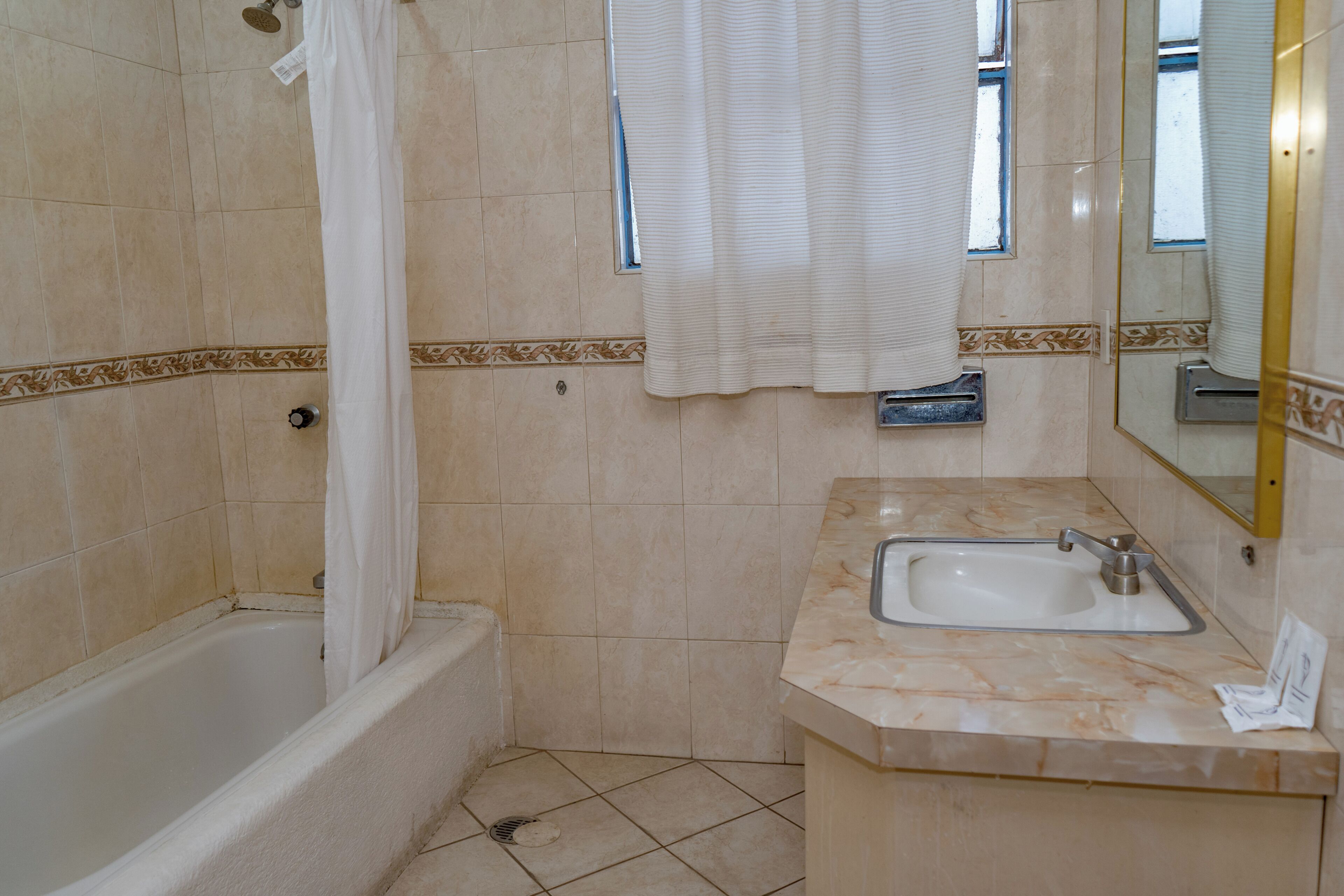 Quadruple Room | Bathroom | Shower, free toiletries, towels