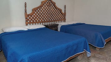 Standard Quadruple Room | In-room safe, bed sheets