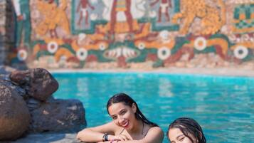 2 outdoor pools, open 9 AM to 7 PM, pool umbrellas, sun loungers