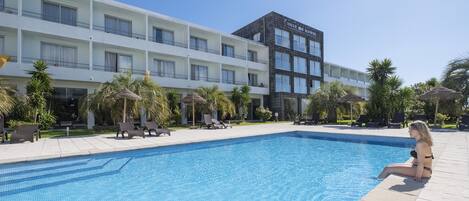 Indoor pool, outdoor pool, pool umbrellas, sun loungers