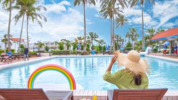 Outdoor pool, open 7:30 AM to 5:00 PM, pool loungers