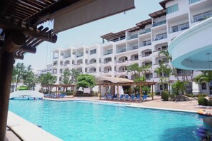Outdoor pool, pool umbrellas, sun loungers