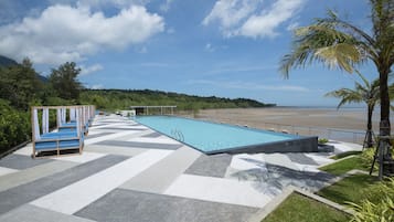 Outdoor pool, open 10:00 AM to 7:00 PM, free pool cabanas, pool loungers