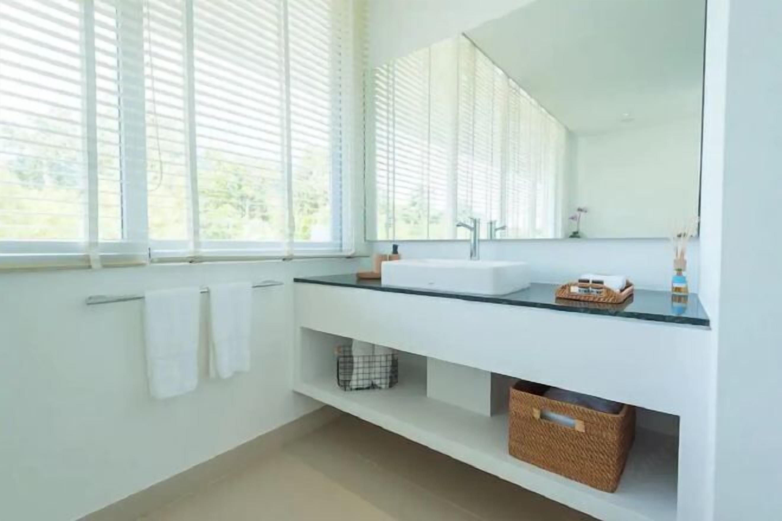 Bathroom | Shower, designer toiletries, hair dryer, bathrobes