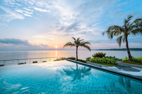 Outdoor pool, open 10:00 AM to 7:00 PM, free cabanas, sun loungers