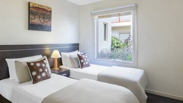 Desk, iron/ironing board, cribs/infant beds, rollaway beds