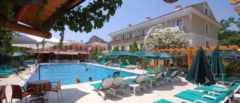 Indoor pool, outdoor pool, pool umbrellas, sun loungers