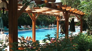 Indoor pool, outdoor pool, pool umbrellas, sun loungers
