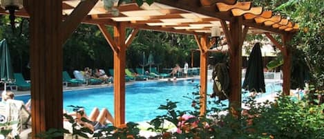 Indoor pool, outdoor pool, pool umbrellas, sun loungers