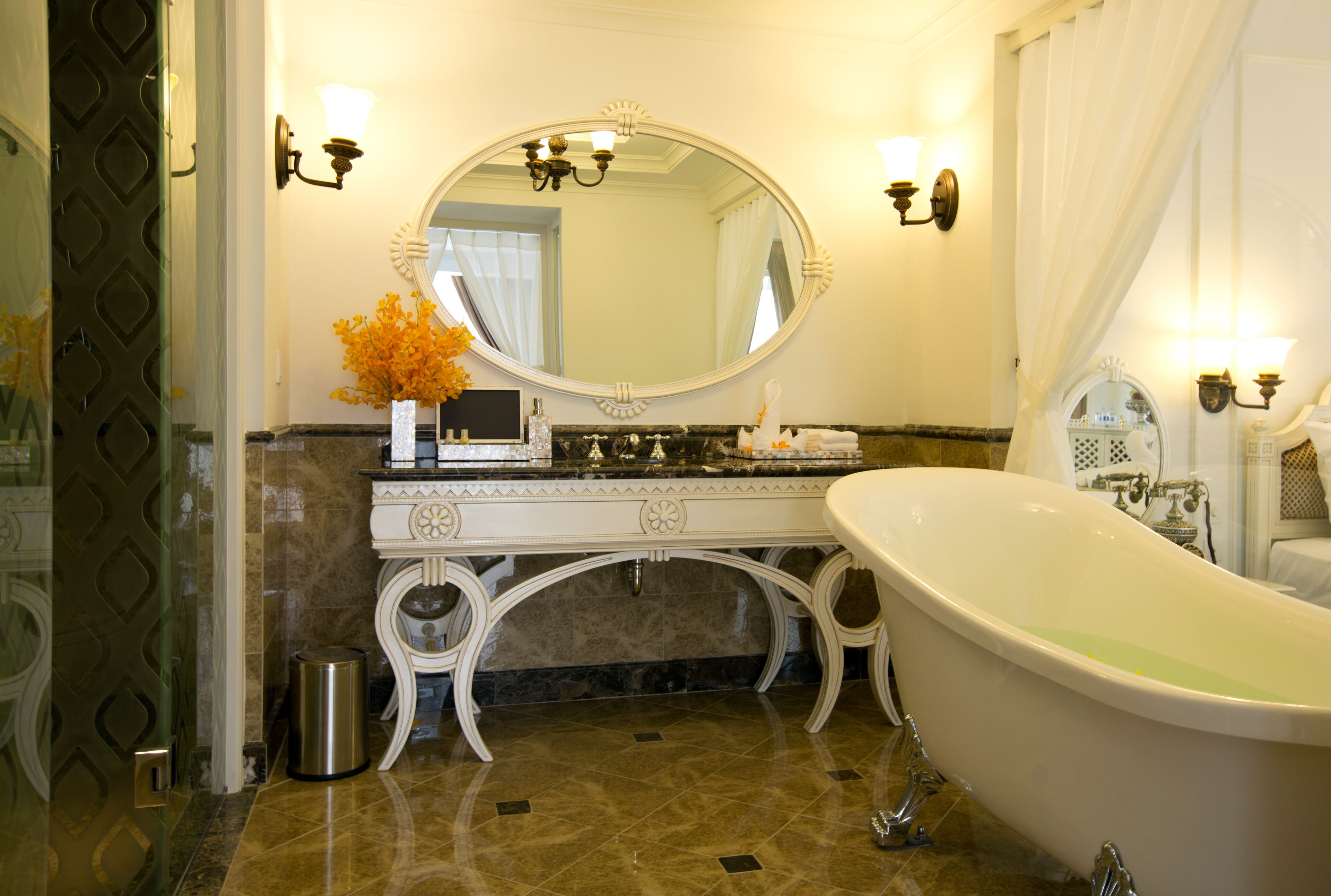 separate bathtub and shower, deep-soaking bathtub, rainfall showerhead