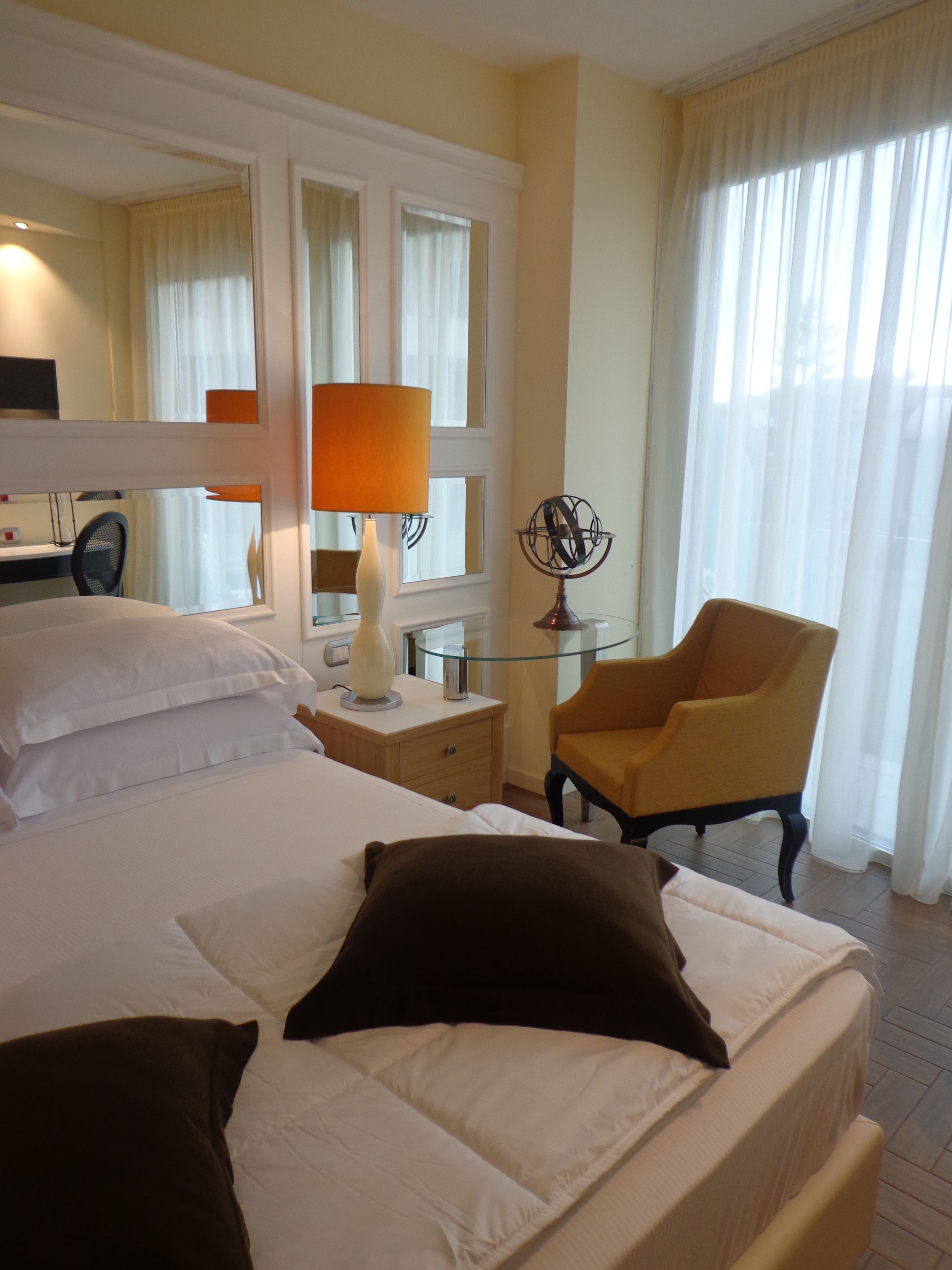 premium bedding, down duvets, minibar, in-room safe