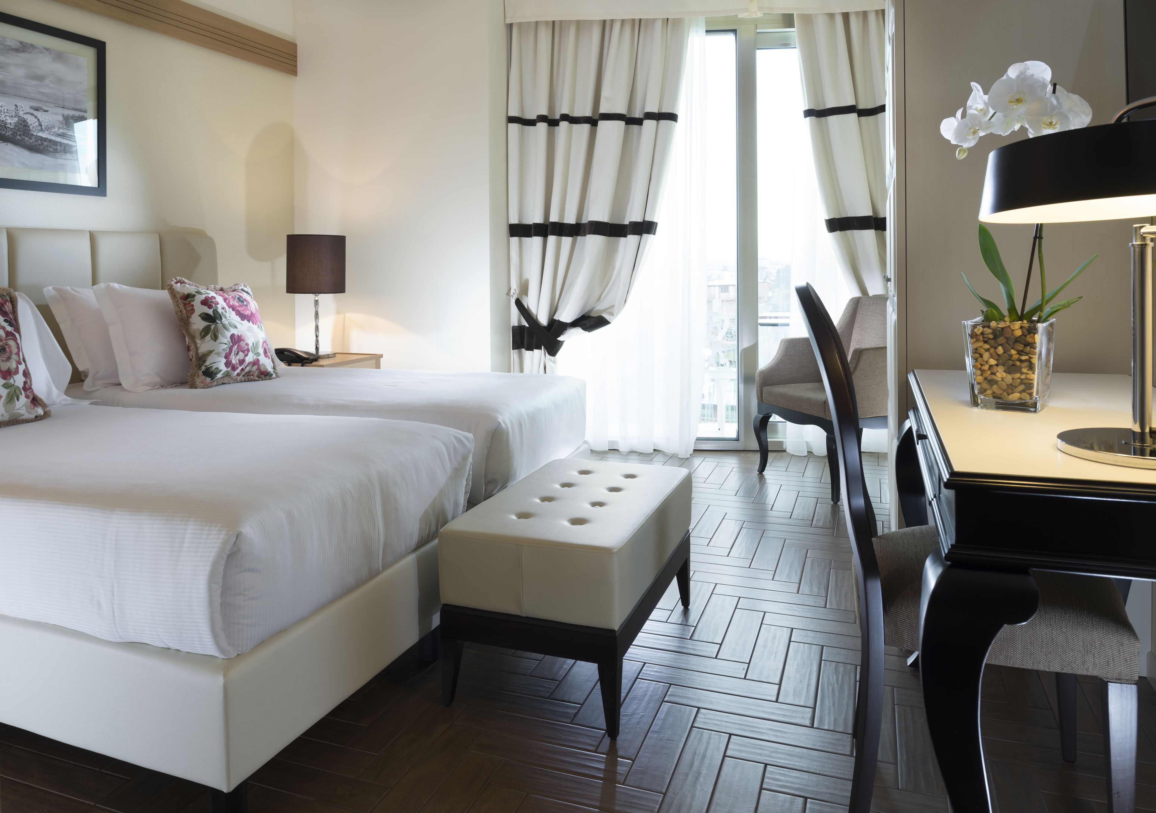 premium bedding, down duvets, minibar, in-room safe