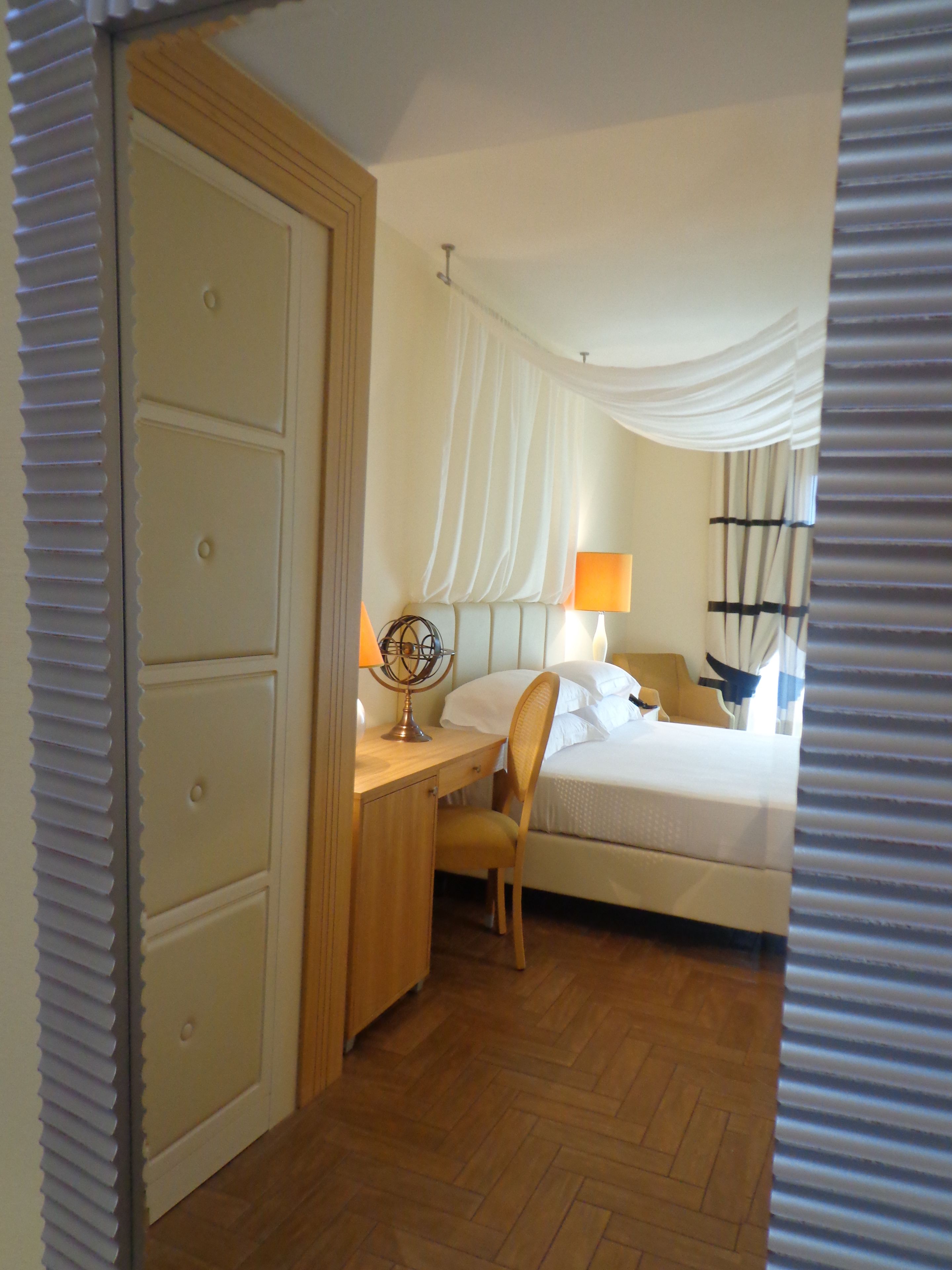 premium bedding, down duvets, minibar, in-room safe