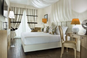 Premium bedding, down duvets, minibar, in-room safe