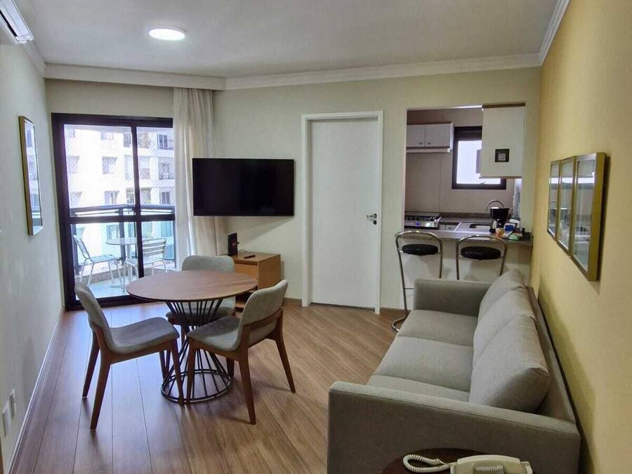 Apartamento executivo | Sala de estar | Smart TV 32 polegadas com canais a cabo