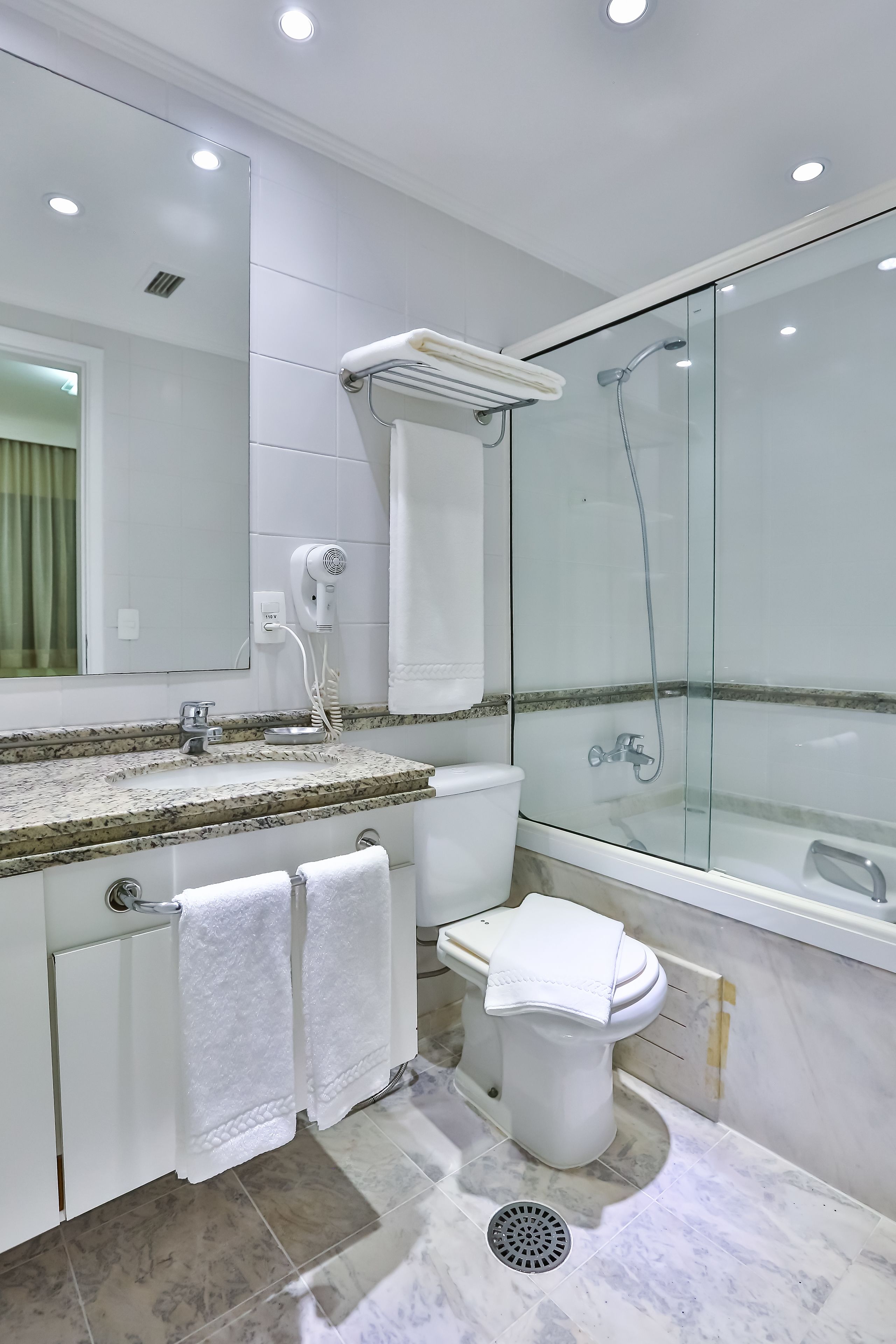 executive apartment | bathroom | separate bathtub and shower, jetted bath, rainfall showerhead