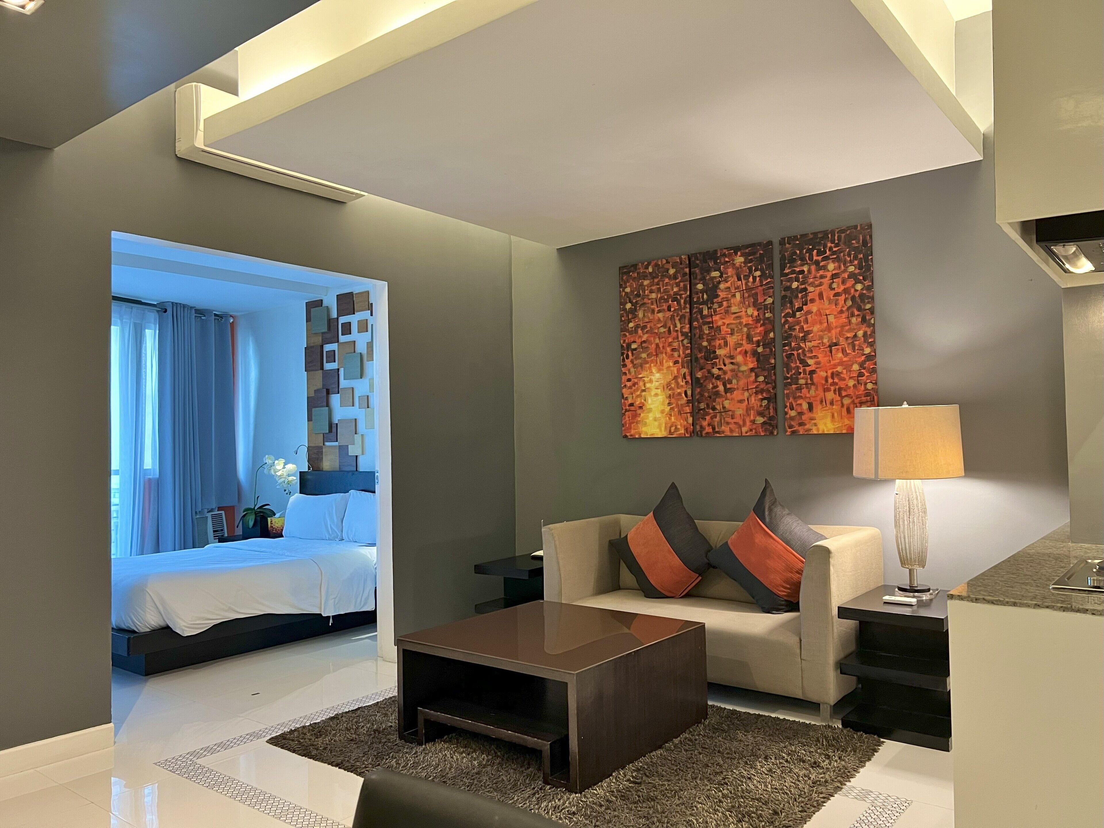 Two Bedroom Suite | Living area | Flat-screen TV