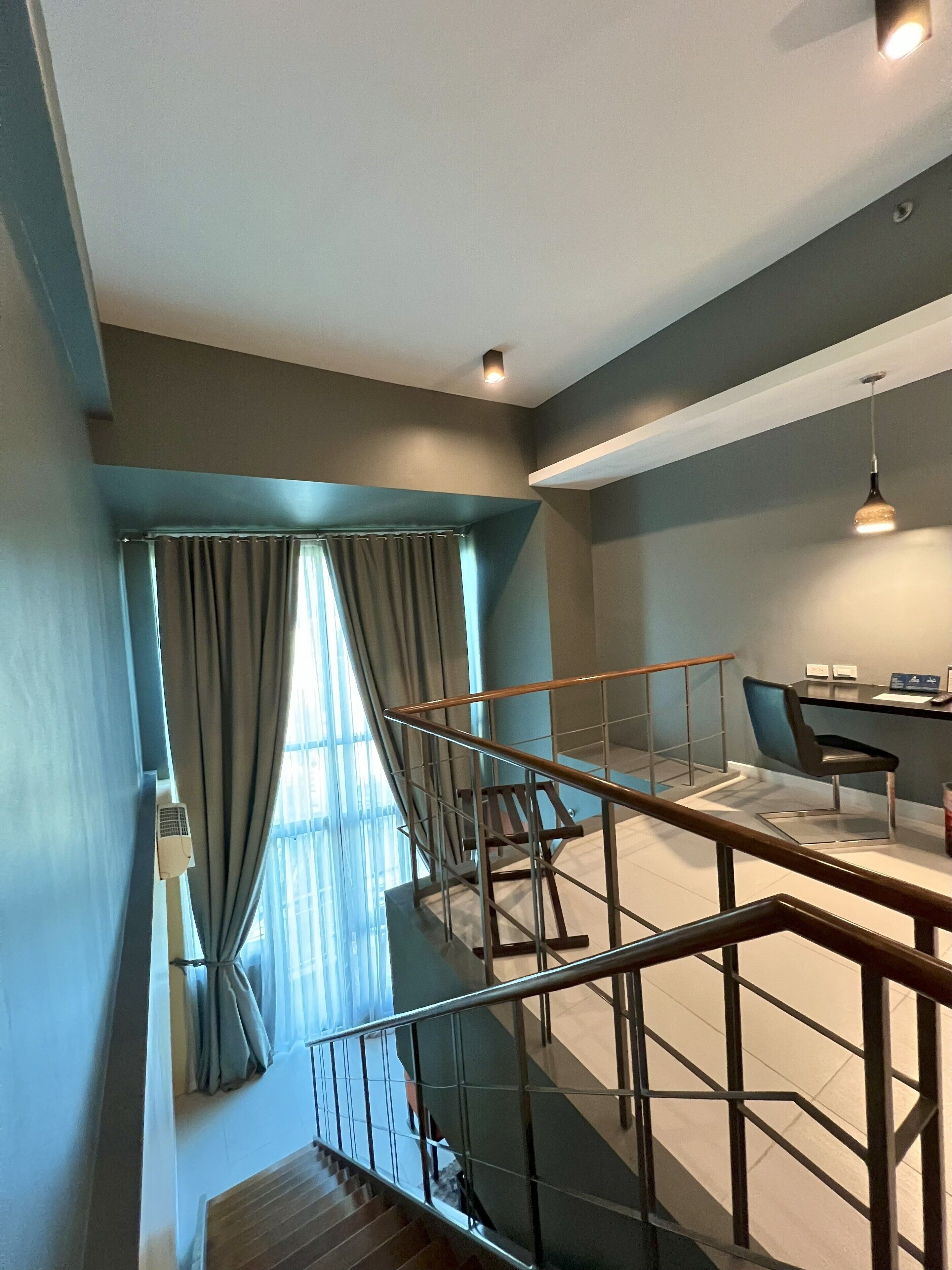 1 bedroom loft | living area | flat-screen tv
