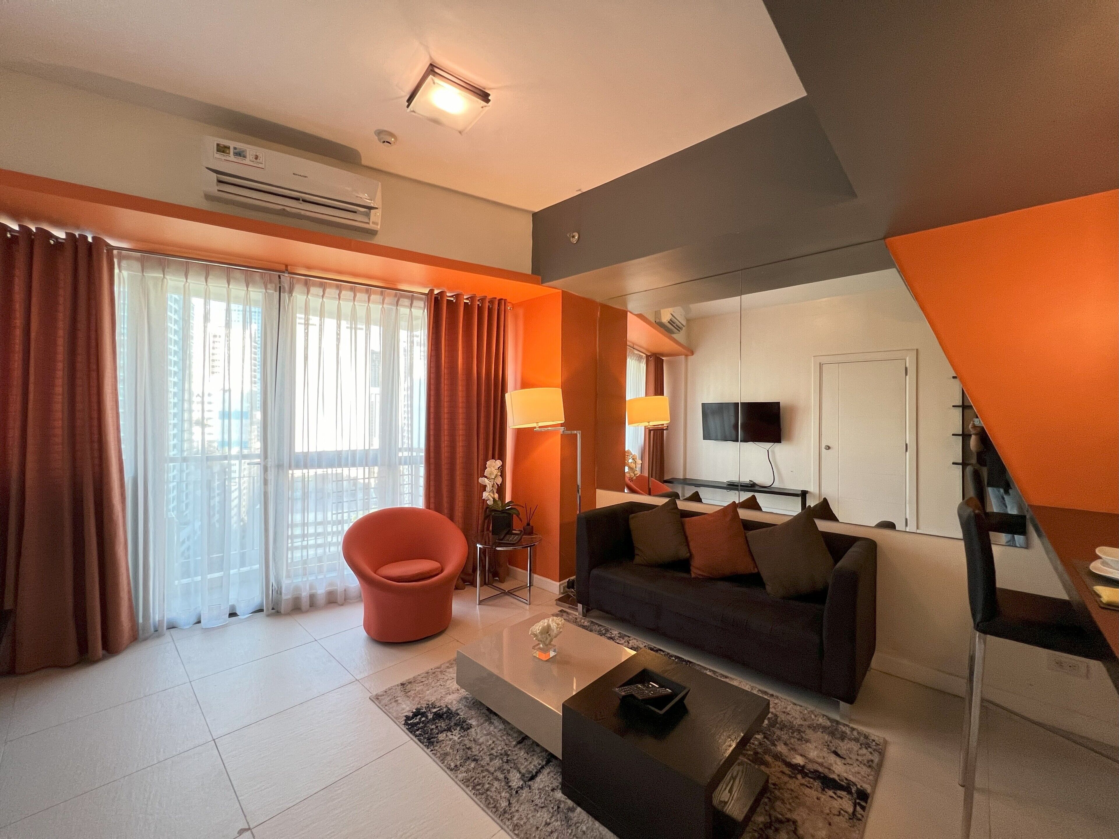 one bedroom premier | living area | flat-screen tv