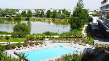 Seasonal outdoor pool, open 10:00 AM to 8:00 PM, sun loungers