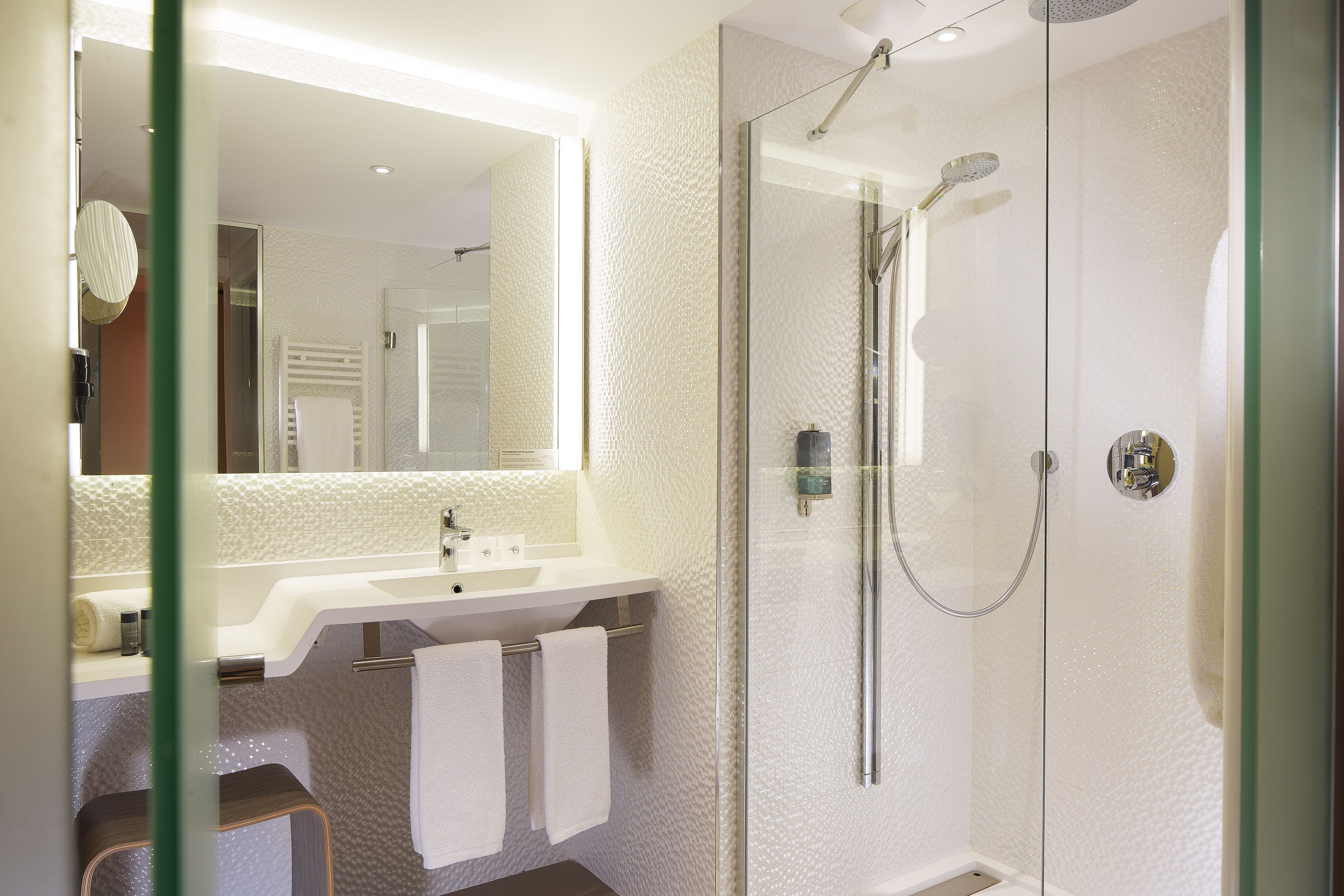 shower, rainfall showerhead, hair dryer, towels