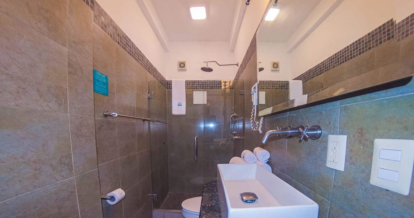 studio room | bathroom | shower, free toiletries, towels