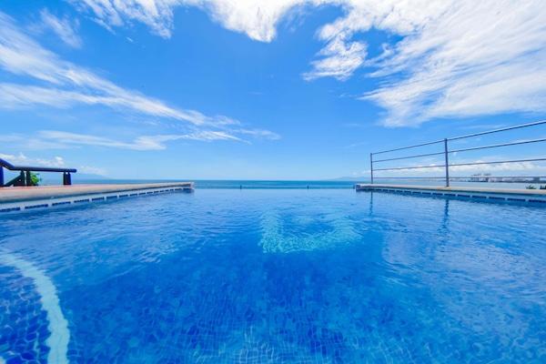 Outdoor pool, open 10 AM to 10 PM, sun loungers