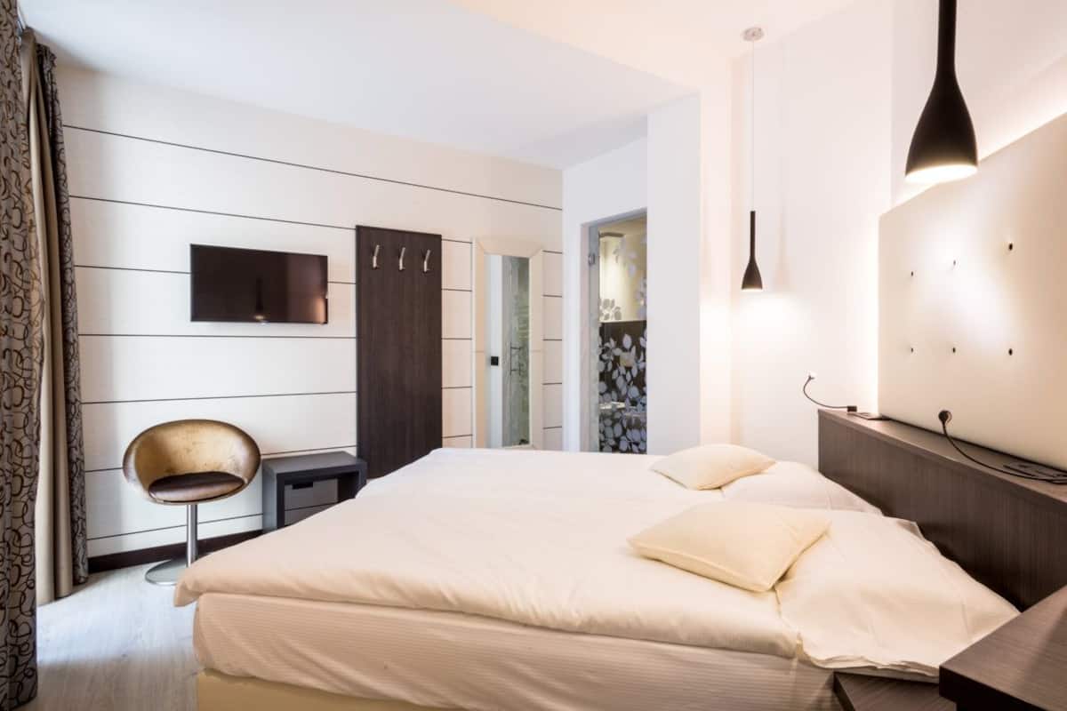 double or twin room | premium bedding, in-room safe, desk, free wifi