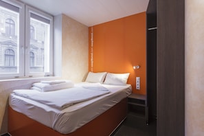 Room | Hypo-allergenic bedding, blackout drapes, iron/ironing board, free WiFi