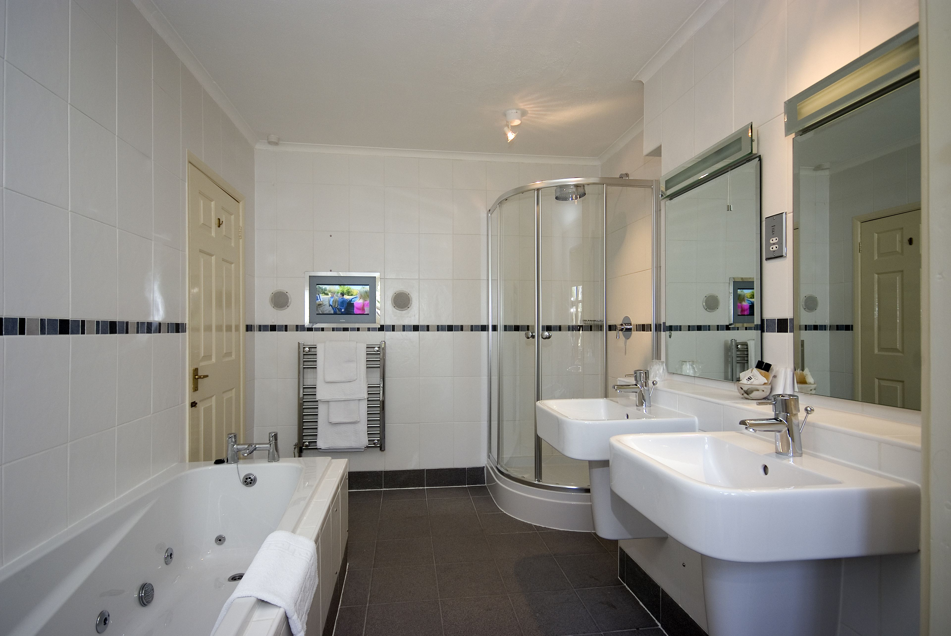 deluxe room | bathroom | hair dryer, towels