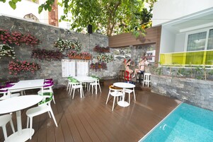 Seasonal outdoor pool, pool umbrellas, sun loungers