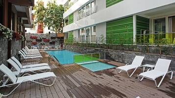 Seasonal outdoor pool, pool umbrellas, pool loungers