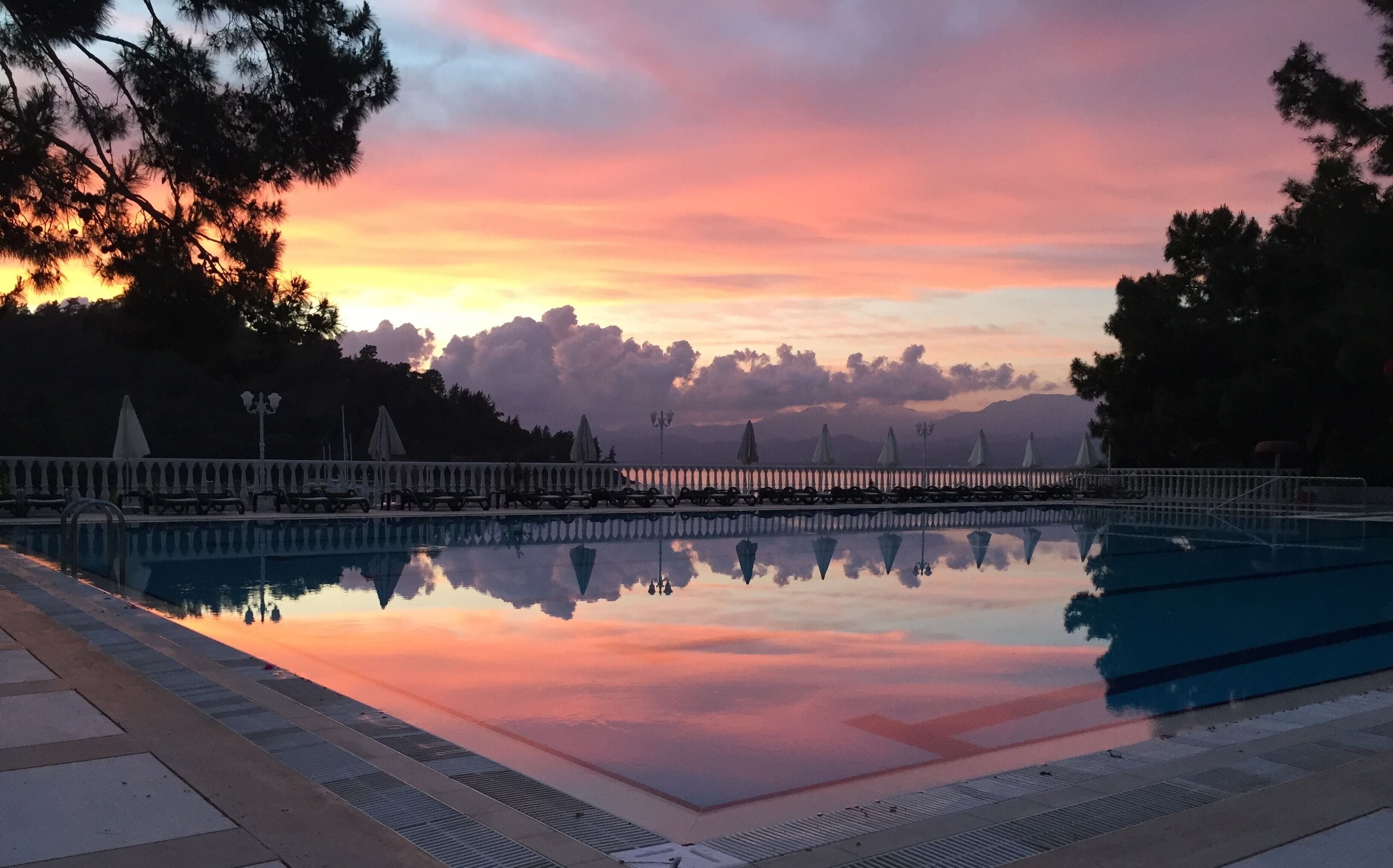 indoor pool, 3 outdoor pools, pool umbrellas, lifeguards on site