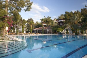Indoor pool, 3 outdoor pools, pool umbrellas, lifeguards on site