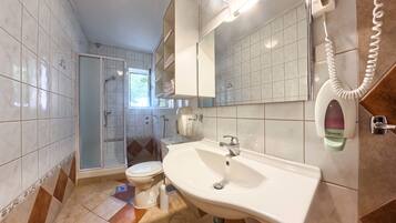Apartment, 1 Bedroom, Balcony, Sea View | Bathroom | Hair dryer, towels